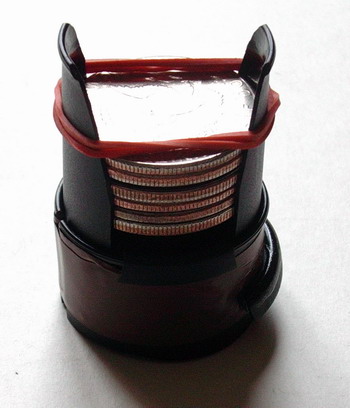 chargeur de pièces